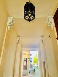 Low angle view of chandelier hanging in building