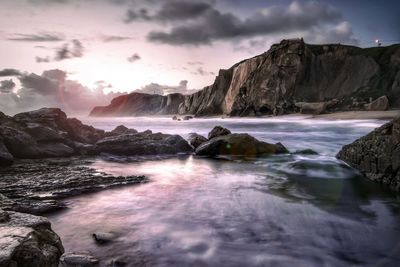 Scenic view of sea against sky during sunset