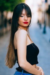 Portrait of beautiful woman standing in traditional clothing