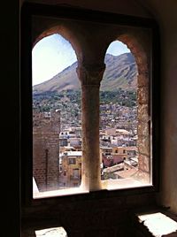 Cityscape seen through window