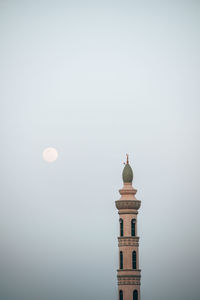 Low angle view of lighthouse against clear sky