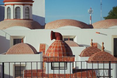 Row of traditional building against sky