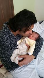 Rear view of couple kissing