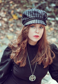 Portrait of beautiful young woman outdoors