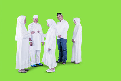 People standing against white background