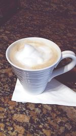 Close-up of cappuccino on table