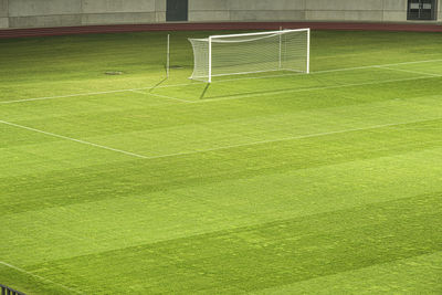 Empty football stadium stripe grass