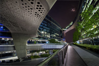 Low angle view of modern building at night