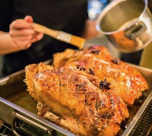 Close-up of man preparing food