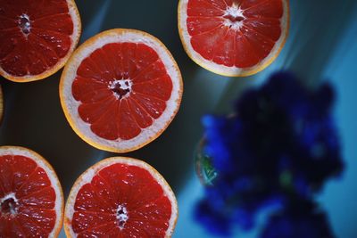 Directly above shot of grapefruit slices on table