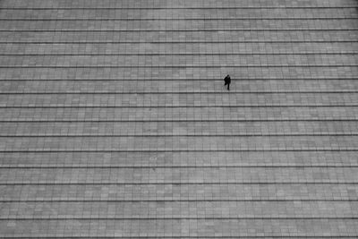 View of man walking on stairs