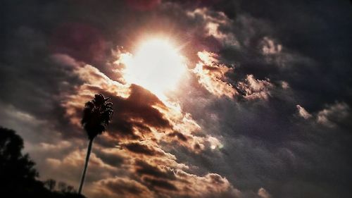 Low angle view of cloudy sky at sunset