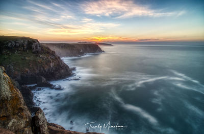 Scenic view of sea against sky during sunset