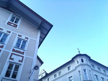 Low angle view of building against blue sky