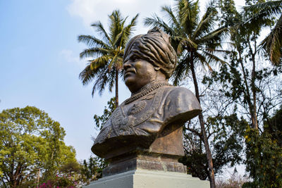 Low angle view of statue against sky