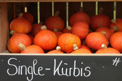 Close-up of pumpkins for sale at market stall