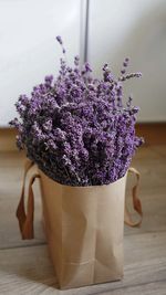 Close-up of purple flowering plant on table