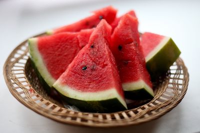 Close-up of fruits in plate on table