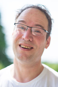 Close-up portrait of a smiling young man