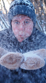 Close-up portrait of person on snow