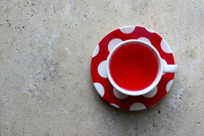 High angle view of tea cup on stone table 