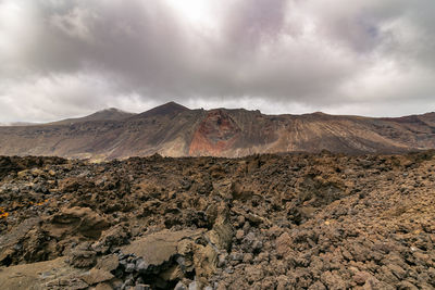 Scenic view of volcanic landscape against sky