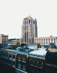 Low angle view of skyscraper against clear sky