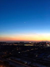 View of cityscape at sunset