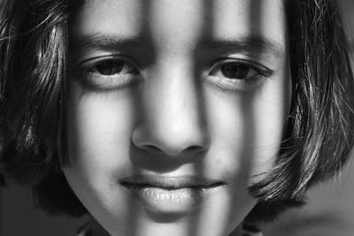 Close-up portrait of smiling girl