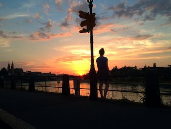 Silhouette of people at sunset