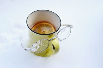 Close-up of drink against white background