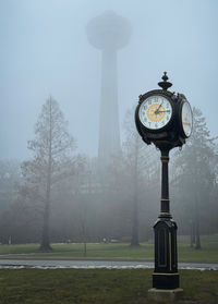 A quarter past one, niagara falls rotary clocks with skylon tower on background