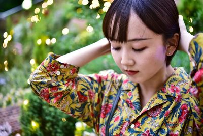 Close-up of girl looking away outdoors