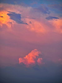 Low angle view of clouds in sky during sunset