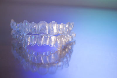 Close-up of artificial teeth on table