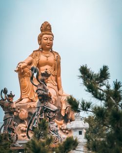 Low angle view of statue against clear sky