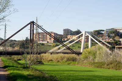 Bridge over land against clear sky