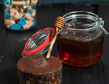 Close-up of glass jar on table