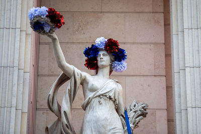 Statue of flower against wall/ russia day