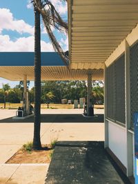 Swimming pool by sea against sky