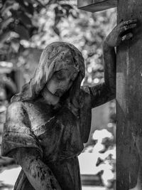 Close-up of statue in cemetery
