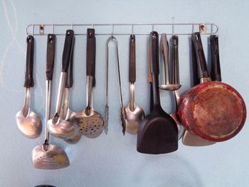 High angle view of objects hanging on wall