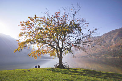 Scenic view of lake with mountains in background