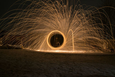 Light painting against star shape at night