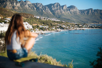 Rear view of woman looking at sea