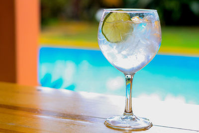 Close-up of wineglass on table