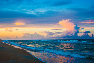 Scenic view of sea against sky during sunset