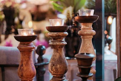 Close-up of candles on table