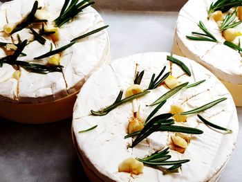 High angle view of white flowers in plate on table