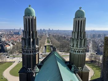 Panoramic view of buildings in city against sky